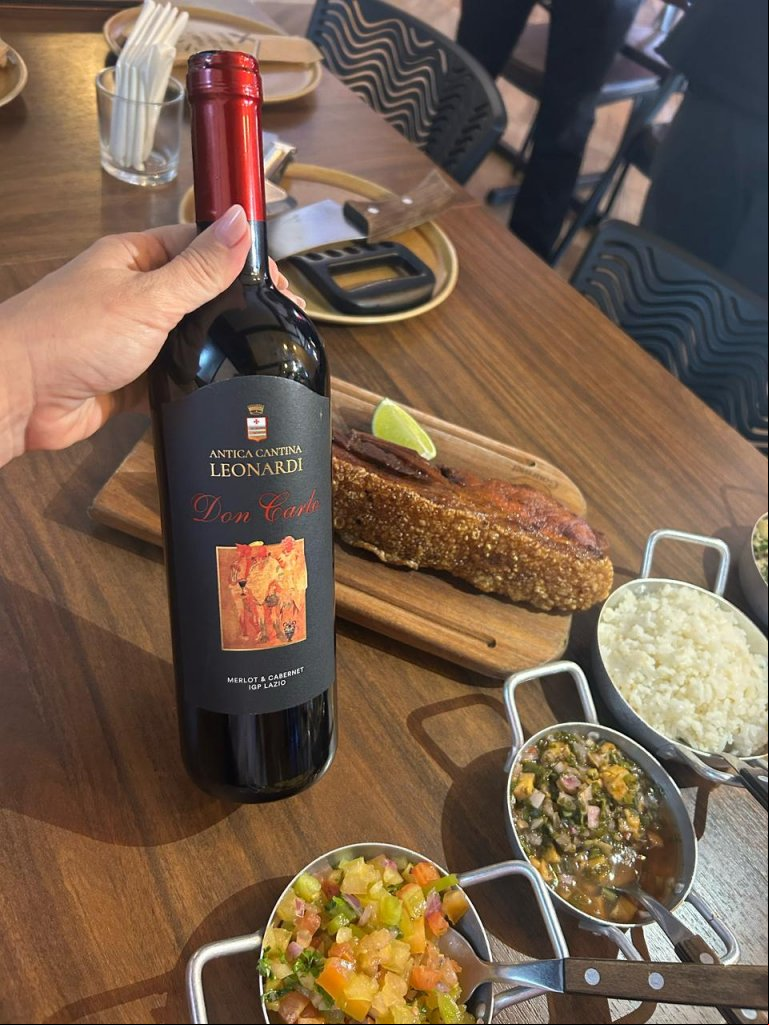 Vinho por Ela